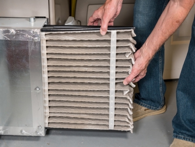 changing out a dirty air filter