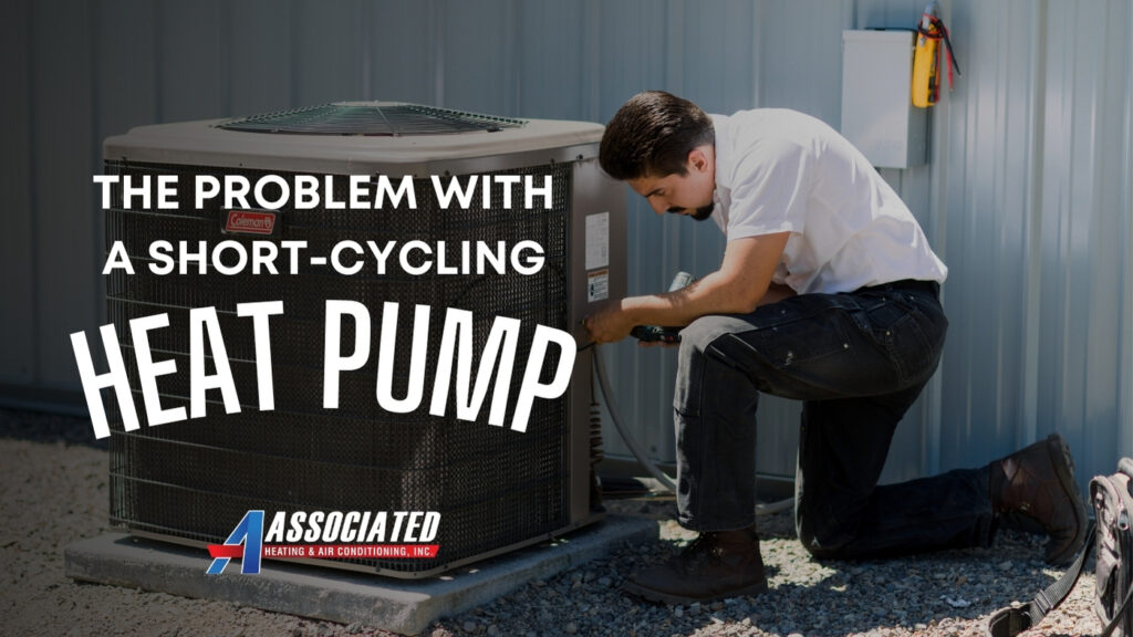 Technician repairing an outdoor heat pump unit with text highlighting short-cycling heat pump issues.