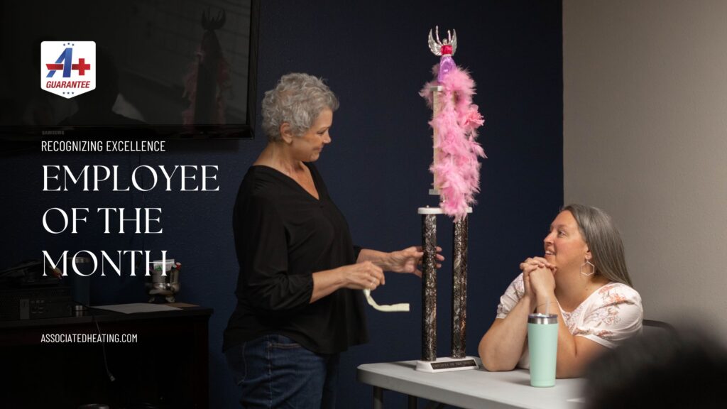 September 2023 Employee of the Month, Kim, accepting her award from Associated Heating & Air Conditioning in Eugene, Oregon.