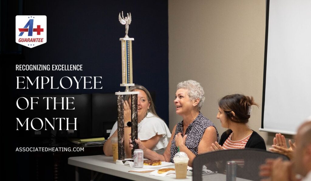 August 2023 Employee of the Month, Debbie, accepting her award from Associated Heating & Air Conditioning in Eugene, Oregon.