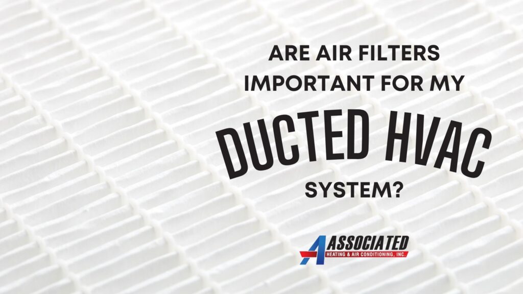 Close-up of a white HVAC air filter with text discussing ducted HVAC and air filter replacement importance.